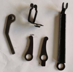 Agricultural machinery parts stamping and welding assembly